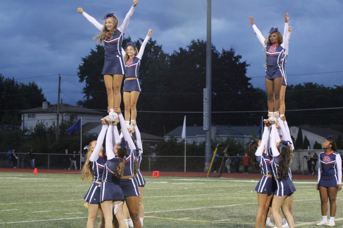 READY SET | Cheer participates in an active sideline season from August to September. Cheering at home football games the team works to hype up the crowd. As soon as the final game happens the teams switch gears to work towards the competitive season. 