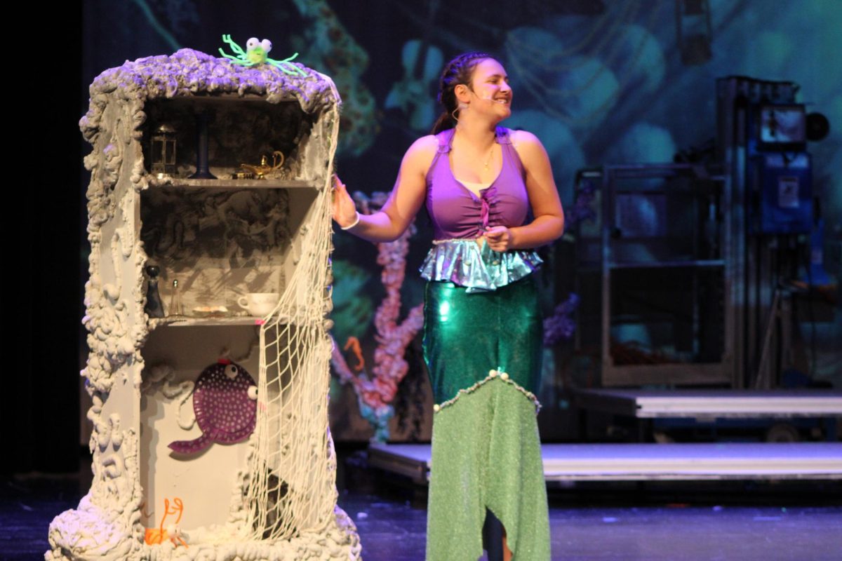 If only pictures had sound.  Aliyah Gorski '26 took the stage as the beloved mermaid Ariel and sang her show stopping solo “Part of your world”, a pivotal moment in both the show and the development of our dear main character.